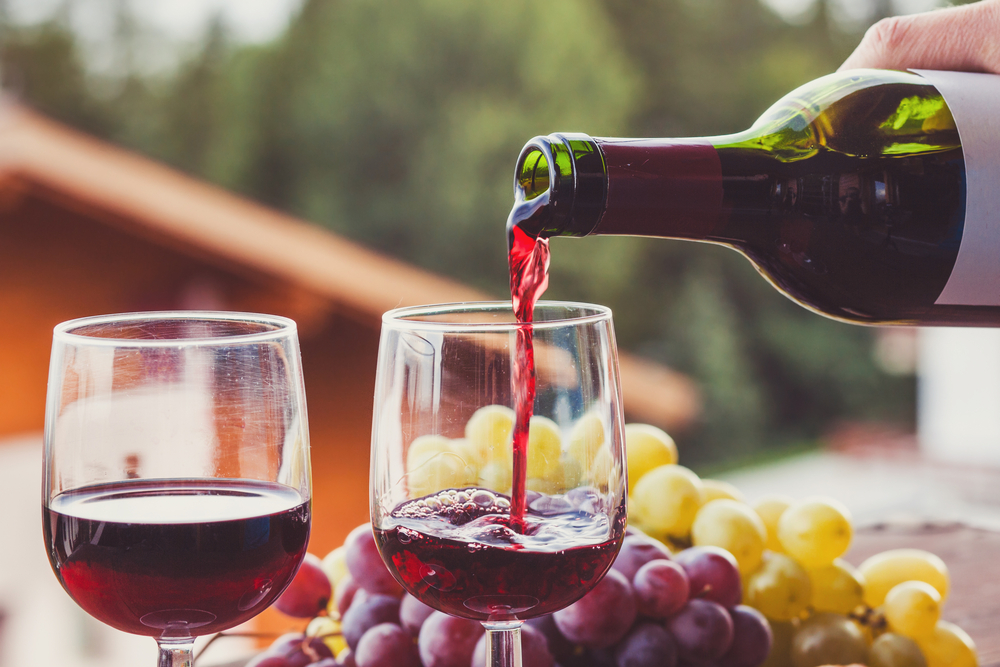 Pouring red wine